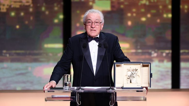 CANNES, FRANCE - MAY 13: Robert De Niro accepts the honorary Palme d'Or onstage during the opening ceremony at the 78th annual Cannes Film Festival at the Palais de Festival on May 13, 2025 in Cannes, France. (Photo by Andreas Rentz/Getty Images)