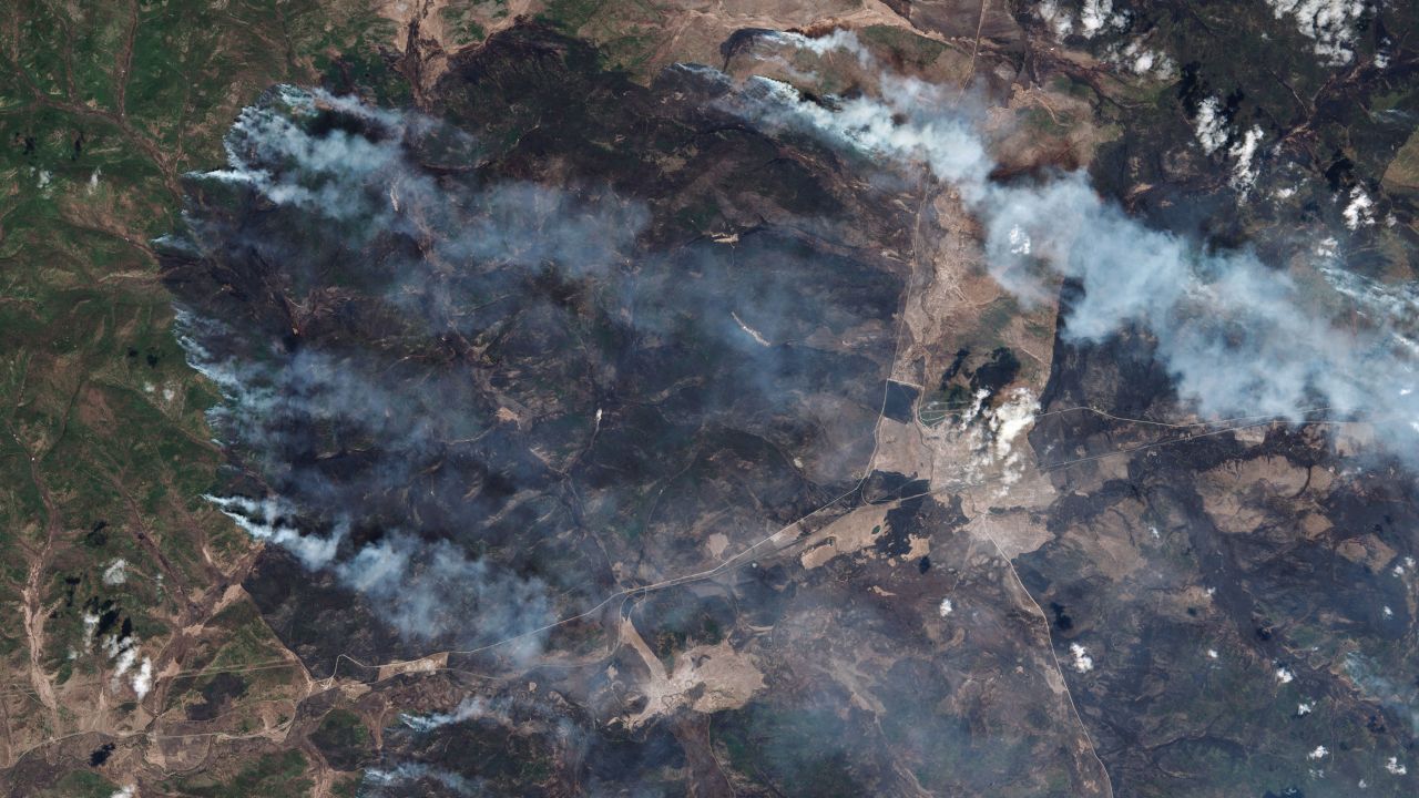 A satellite view of the rapidly spreading wildfires in the Siberian republic of Buryatia, located in the Russian Far East near Lake Baikal, on May 13, 2025. Authorities have declared a state of emergency as massive blazes engulf thousands of hectares.