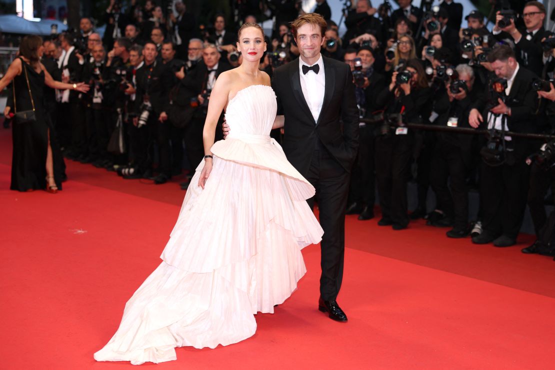 Jennifer Lawrence and Robert Pattinson were all smiles on the red carpet. In their film,