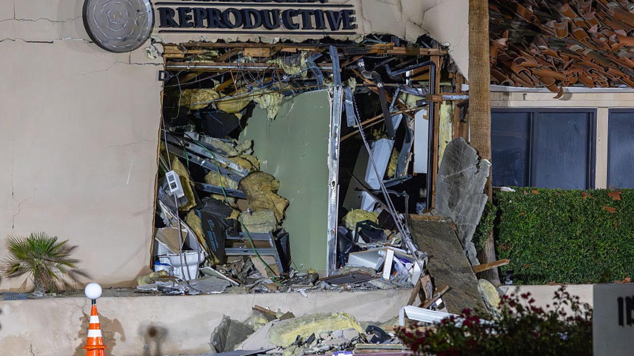 PALM SPRINGS, CALIFORNIA - MAY 17: The damaged front of the American Reproductive Centers fertility clinic stands following a bomb blast on May 17, 2025 in Palm Springs, California. A suspected bomber is believed to have post a manifesto to social media before the explosion. One person was confirmed dead at the scene, according to police. (Photo by David McNew/Getty Images)