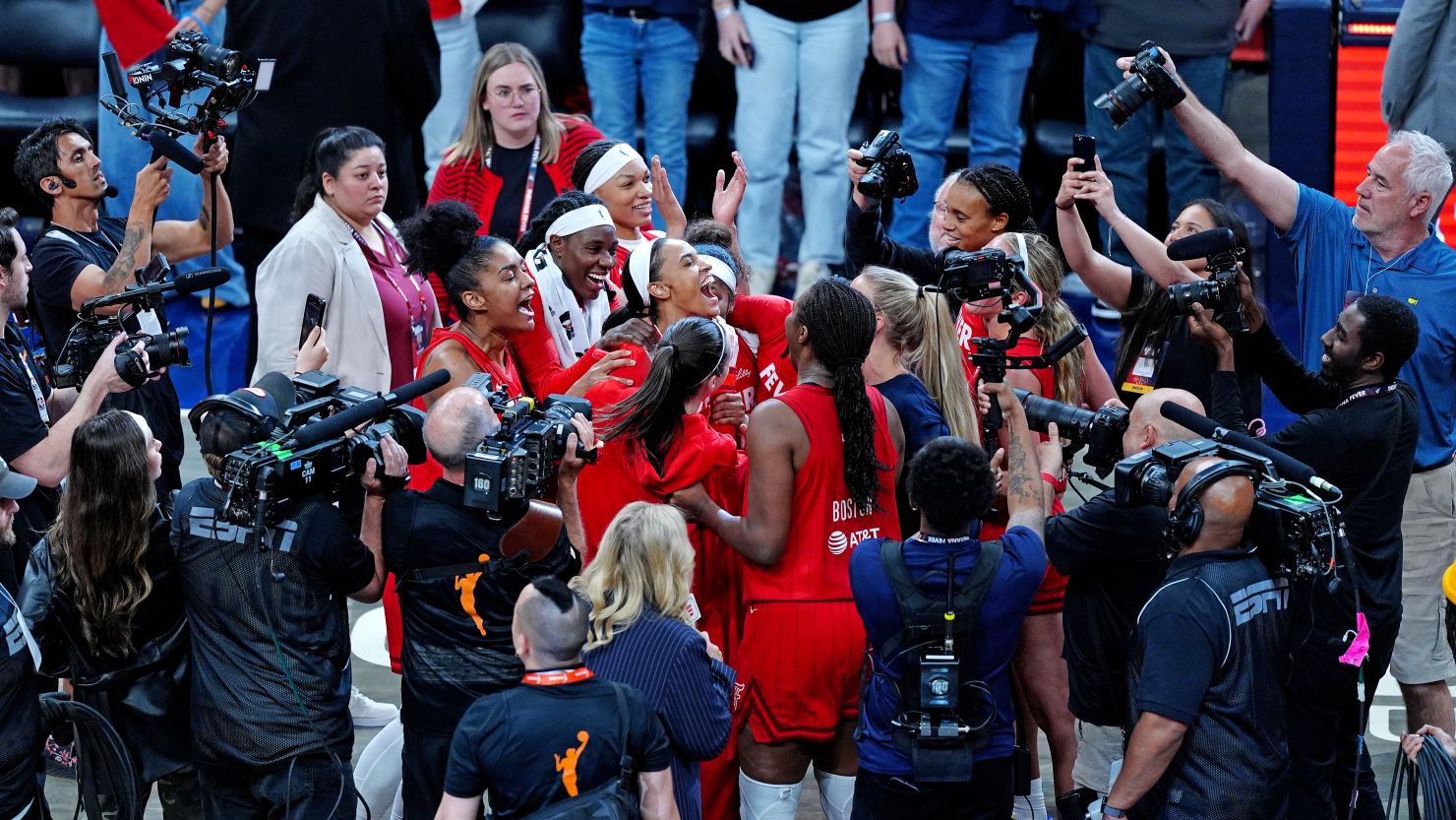 The Indiana Fever celebrate after defeating the Chicago Sky in their season opener last month.