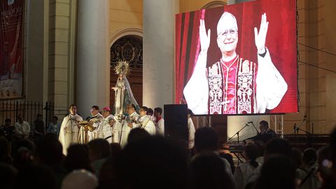 People participate in a vigil before a Holy Mass for the beginning of the Pontificate of Pope Leo XIV, in front of the Cathedral of Saint Mary in Chiclayo, Peru early on May 18, 2025. Ten days after the soft-spoken Robert Francis Prevost was chosen from among his fellow cardinals to lead the world's 1.4 billion Catholics, his papacy will formally begin in a ceremony at St Peter's Square. (Photo by Diego TORRES / AFP) (Photo by DIEGO TORRES/AFP via Getty Images)          