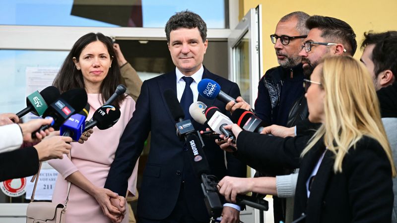 Romania’s pro-EU candidate has lead over hard-right nationalist, preliminary election data shows