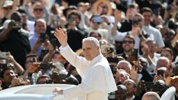 Pope Leo XIV greets the crowd from the popemobile before a Mass for the beginning of his pontificate, in St Peter's square in The Vatican on May 18, 2025.