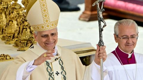 Pope Leo XIV wearing his fisherman's ring waves at the end of a Mass for the formal inauguration of his pontificate in St. Peter's Square at the Vatican, on May 18, 2025. (Photo by Tiziana FABI / AFP) (Photo by TIZIANA FABI/AFP via Getty Images)          