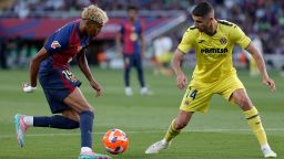 Lamine Yamal of FC Barcelona and Santi Comesana of Villarreal at the Lluis Companys Olympic Stadium on May 18, in Barcelona.