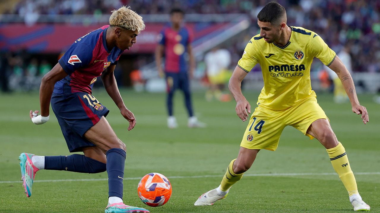 Lamine Yamal of FC Barcelona and Santi Comesana of Villarreal at the Lluis Companys Olympic Stadium on May 18, in Barcelona.