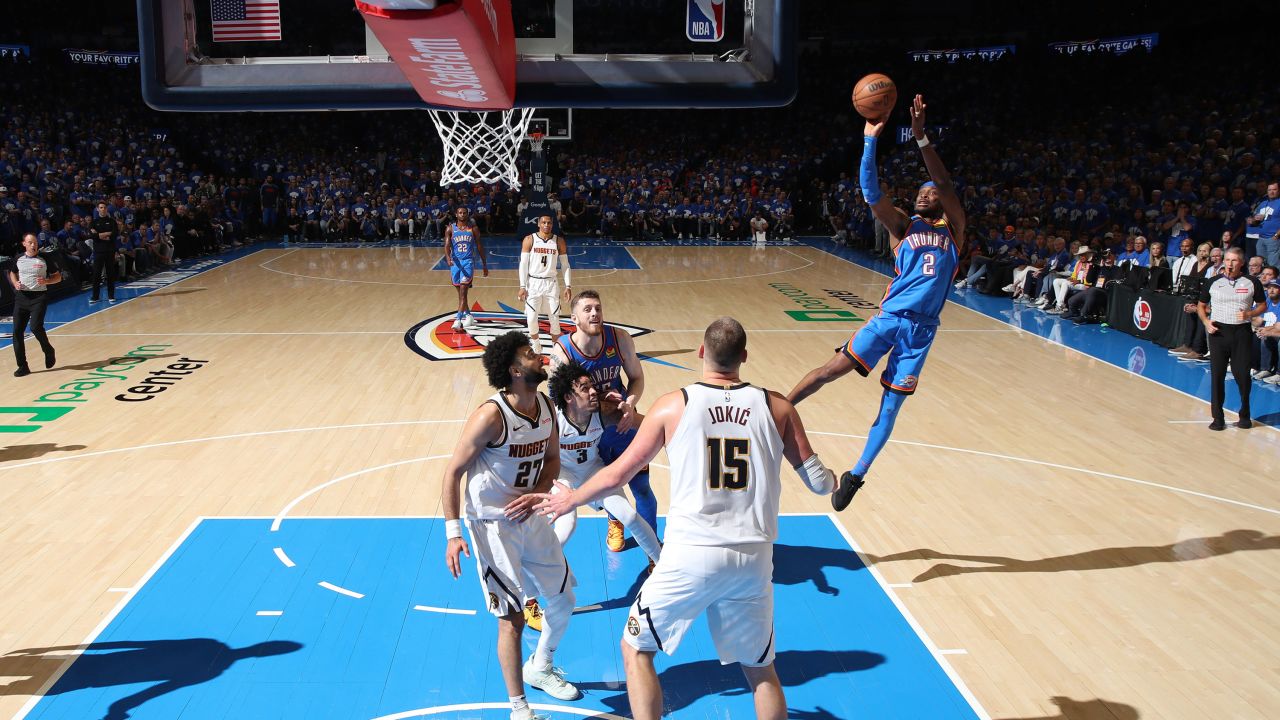 Oklahoma City Thunder guard Shai Gilgeous-Alexander shoots against the Denver Nuggets at Paycom Center in Oklahoma City, Oklahoma, on Sunday.