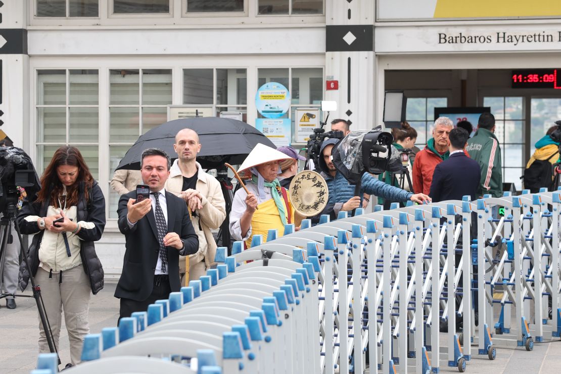 The media gather as delegates for the peace talks hosted by Turkey, aimed at ending the war between Russia and Ukraine, enter the Dolmabahçe Office of the Presidency on May 16 in Istanbul.