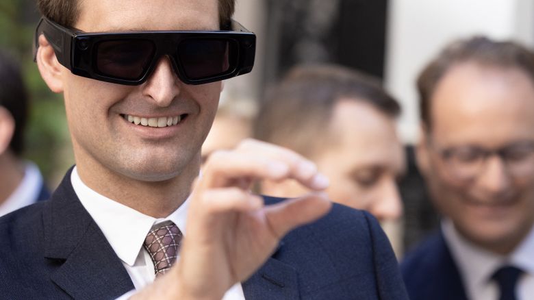 Co-founder and Chief Executive Officer of Snap Inc Evan Spiegel wears the Spectacle Augmented Reality glasses during the inauguration of the group's French headquarters in Paris on May 19, 2025.