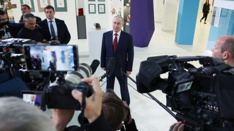 In this pool photograph distributed by the Russian state agency Sputnik, Russian President Vladimir Putin (C) speaks to journalists at the Sirius Educational Center in Sochi on May 19, 2025, after a telephone conversation with US President Donald Trump. (Photo by Vyacheslav PROKOFYEV / POOL / AFP) (Photo by VYACHESLAV PROKOFYEV/POOL/AFP via Getty Images)          