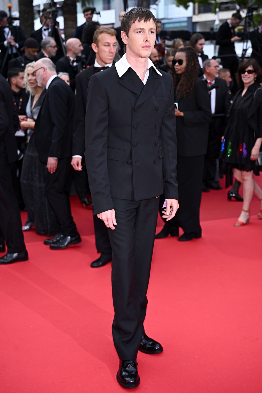 Harris Dickinson wore a black wool garbadine suit from Prada for the premiere of 'Urchin' on 16 May.