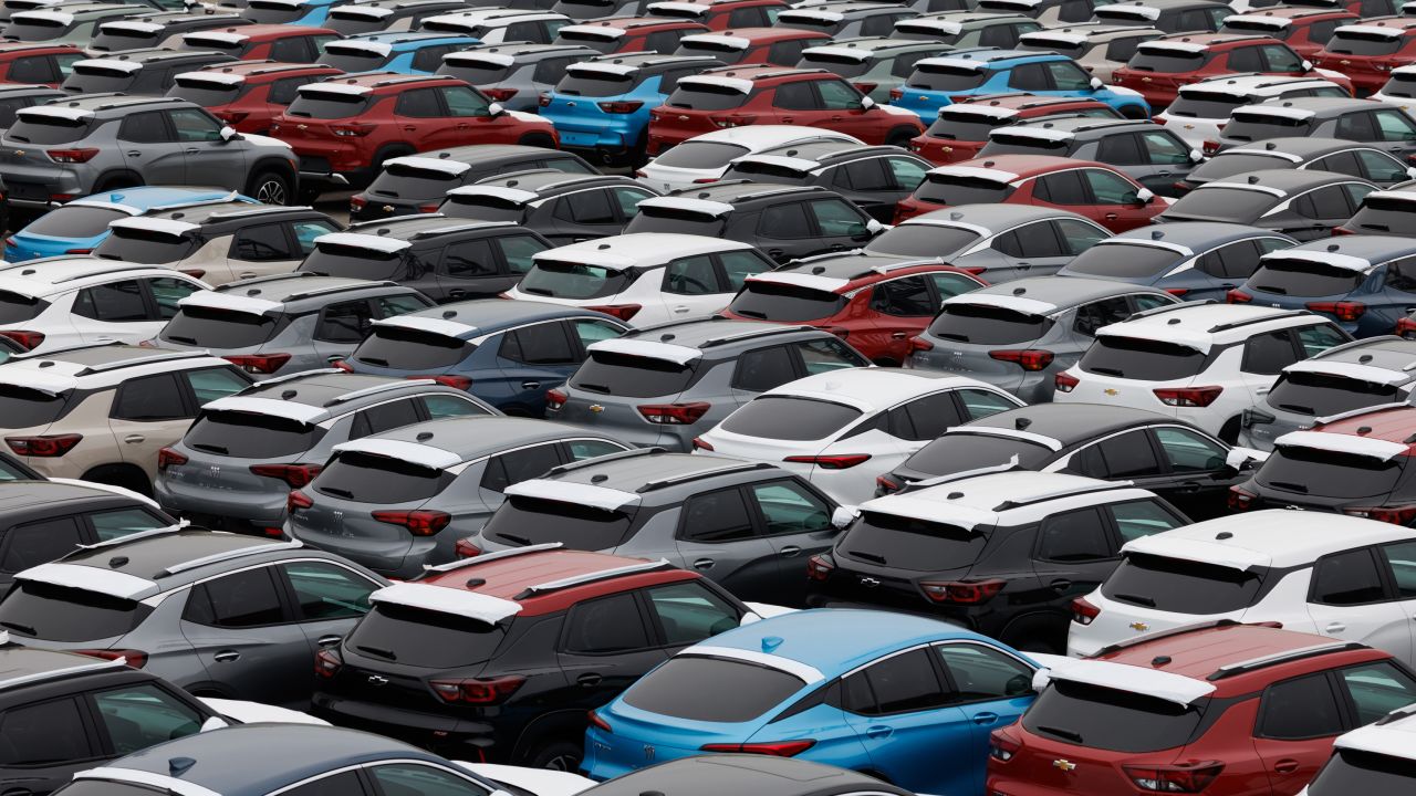General Motors vehicles are ready for export in South Korea on May 20. The company's CEO, Mary Barra, told CNN earlier new tariffs would cost the company up to $5 billion.