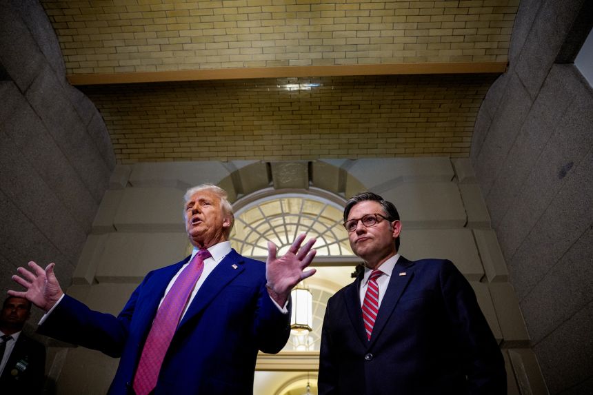 U.S. President Donald Trump, accompanied by Speaker of the House Mike Johnson (R-LA).
