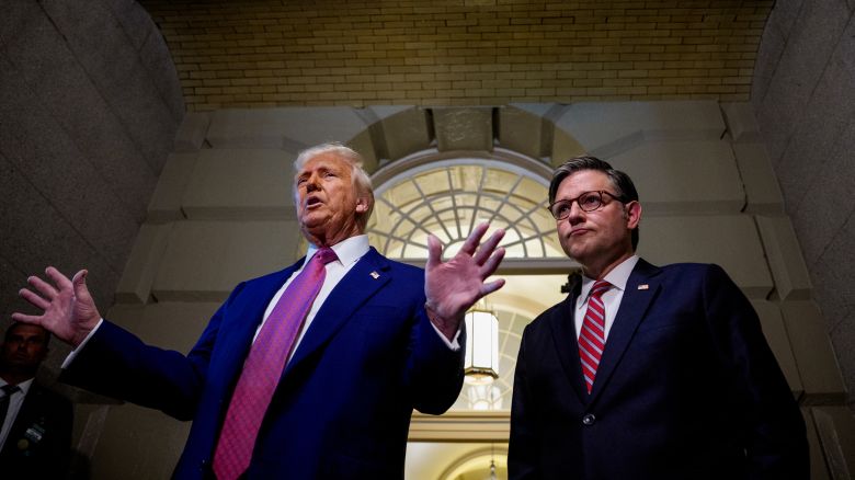 President Donald Trump is accompanied by Speaker of the House Mike Johnson at the US Capitol on May 20, 2025 in Washington, DC.
