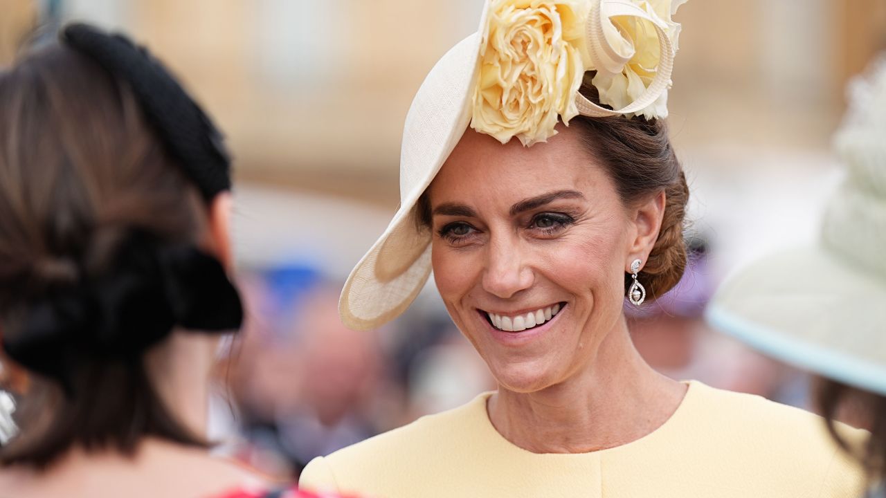 The Princess of Wales greets guests during a Royal Garden Party at Buckingham Palace on May 20 in London, England.