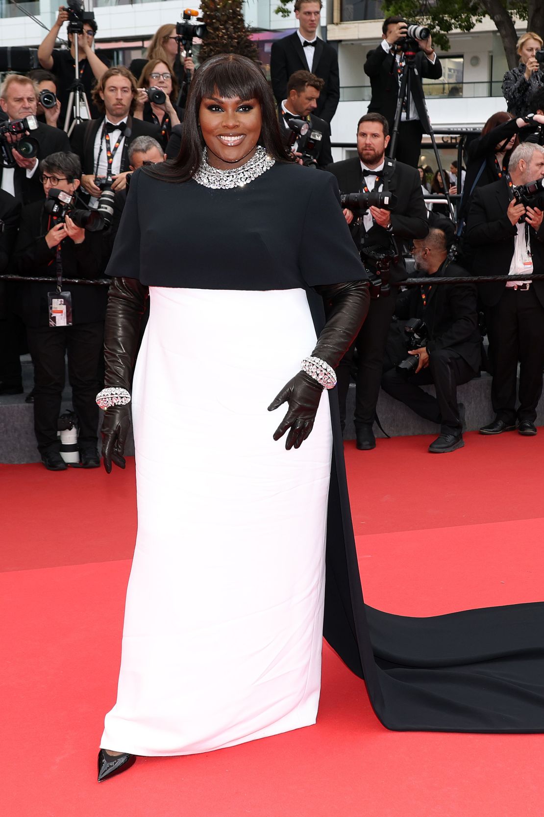 At the 'Nouvelle Vague' (New Wave) red carpet on 17 May, Yseult opted for a Givenchy haute couture silk crepe dress — complete with a black cape.