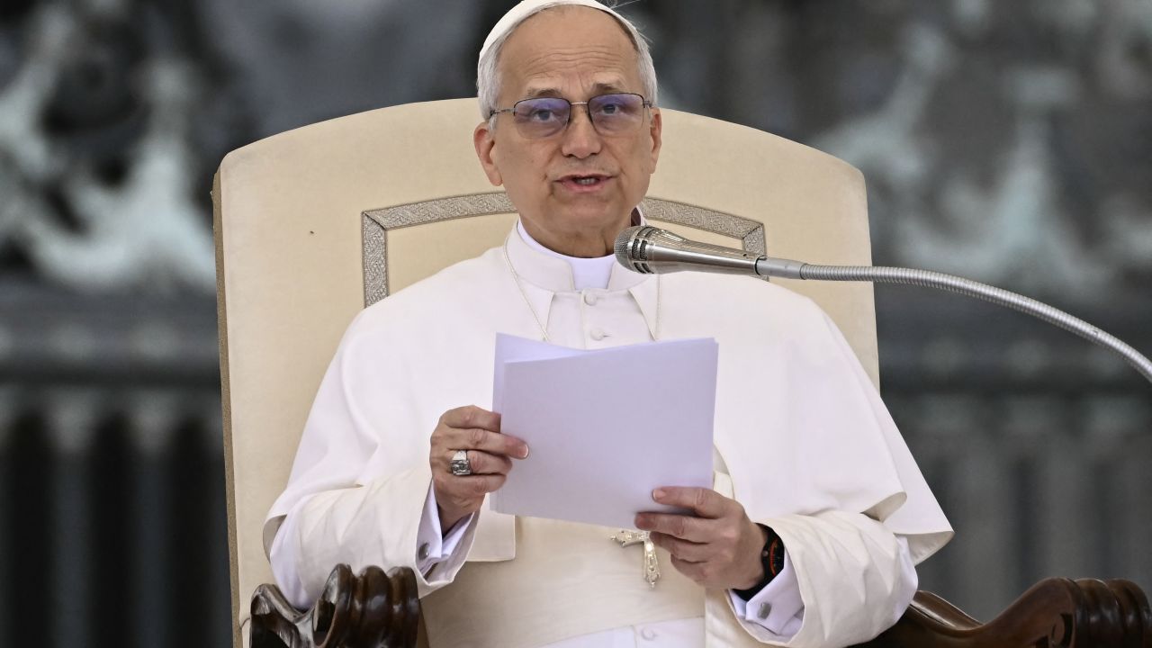 Pope Leo XIV addresses the crowd during the weekly general audience at St Peter's Square in The Vatican on May 21, 2025. (Photo by Filippo MONTEFORTE / AFP) (Photo by FILIPPO MONTEFORTE/AFP via Getty Images)          