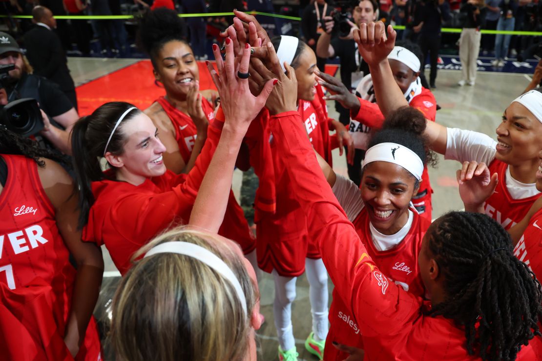 The Fever huddle after their season-opening win over Chicago.