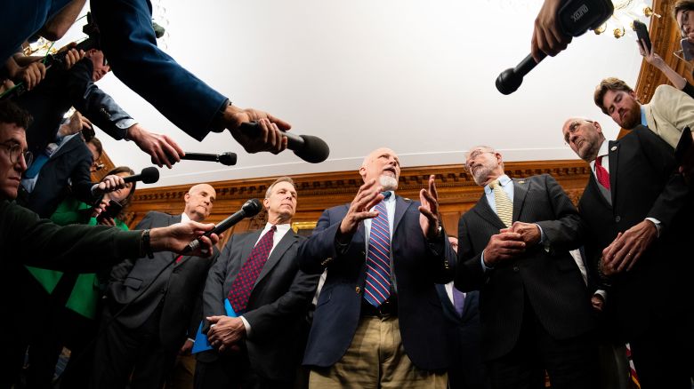 House Freedom Caucus members, from left, Rep. Keith Self, R-Texas, Rep. Scott Perry, R-Pa., Rep. Chip Roy, R-Texas, HFC chair Rep. Andy Harris, R-Md., and Rep. Clay Higgins, R-La., speak to reporters about the One Big Beautiful Bill Act reconciliation package in the US Capitol on Wednesday, May 21.