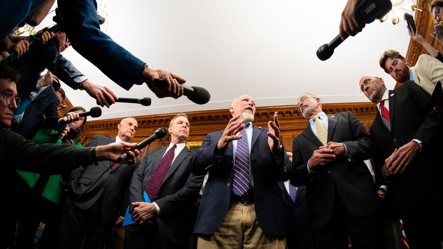 House Freedom Caucus members, from left, Rep. Keith Self, R-Texas, Rep. Scott Perry, R-Pa., Rep. Chip Roy, R-Texas, HFC chair Rep. Andy Harris, R-Md., and Rep. Clay Higgins, R-La., speak to reporters about the One Big Beautiful Bill Act reconciliation package in the US Capitol on Wednesday, May 21.