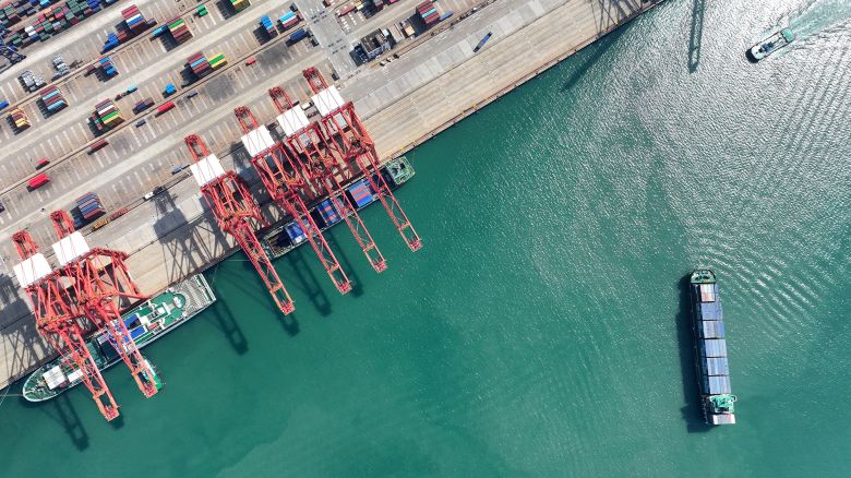 A container ship waits to berth at the port in Lianyungang, in China's eastern Jiangsu province on May 21.