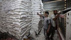 Employees work inside a bakery in Deir el-Balah in the central Gaza Strip, after Israel allowed limited humanitarian aid to enter the Palestinian territory on May 22, 2025. The Hamas government media office reported the arrival of 87 aid trucks, which it said were allocated to international and local organisations to meet "urgent humanitarian needs". (Photo by Eyad BABA / AFP) (Photo by EYAD BABA/AFP via Getty Images)          
