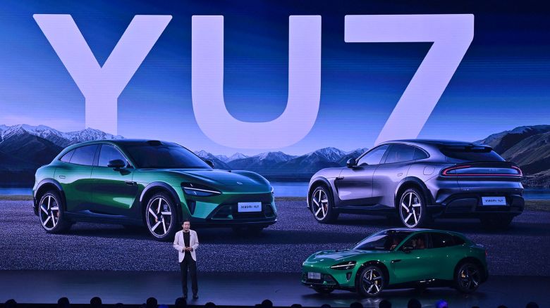 Lei Jun, co-founder and CEO of Xiaomi, speaks during the launch of the Xiaomi YU7 SUV car in Beijing on May 22, 2025. Tech giant Xiaomi unveiled a new advanced in-house mobile chip on Thursday, a significant milestone for the company as Chinese firms shift resources towards home-grown technology against a bleak international trade backdrop. Xiaomi, which sells goods from smartphones to vacuum cleaners and electric vehicles (EVs), is one of China's most prominent consumer electronics firms. (Photo by ADEK BERRY / AFP) (Photo by ADEK BERRY/AFP via Getty Images)          
