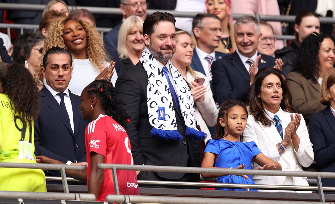 Serena Williams and Alexis Ohanian look on from the stands during the Women's FA Cup Final between Chelsea and Manchester United at Wembley Stadium on May 18.