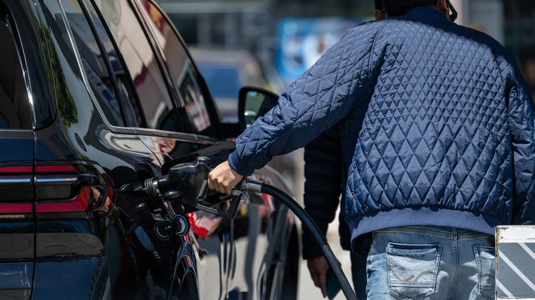 A customer refuels a car at a Chevron gas station in San Francisco, California, US, on Thursday, May 22, 2025.