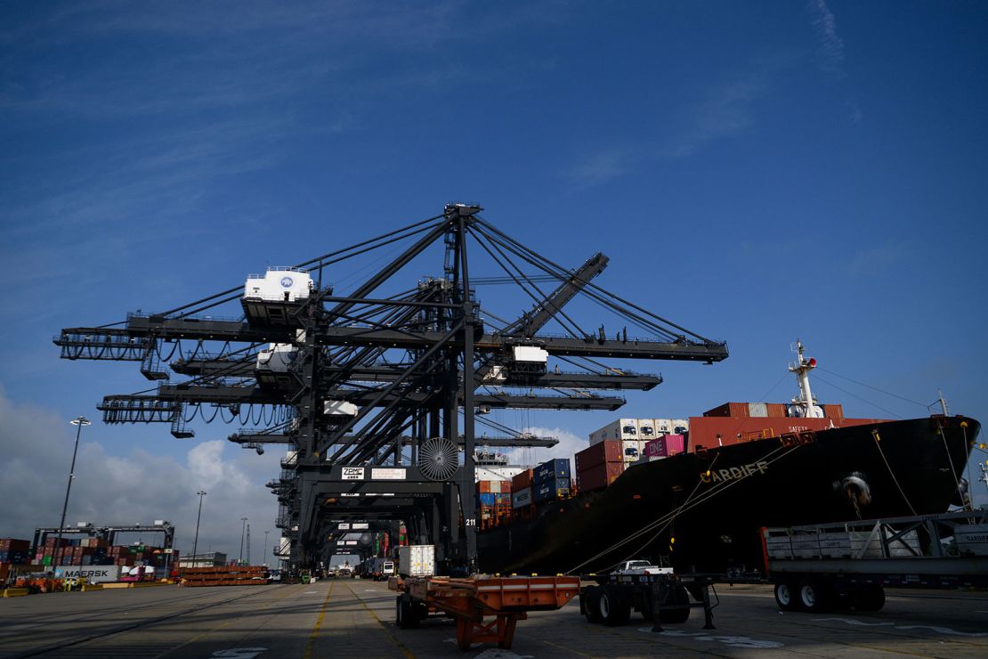 Ship-to-shore (STS) cranes load a container ship at the Bayport Container Terminal at the port of Houston in Seabrook, Texas, US, on Thursday, May 22.