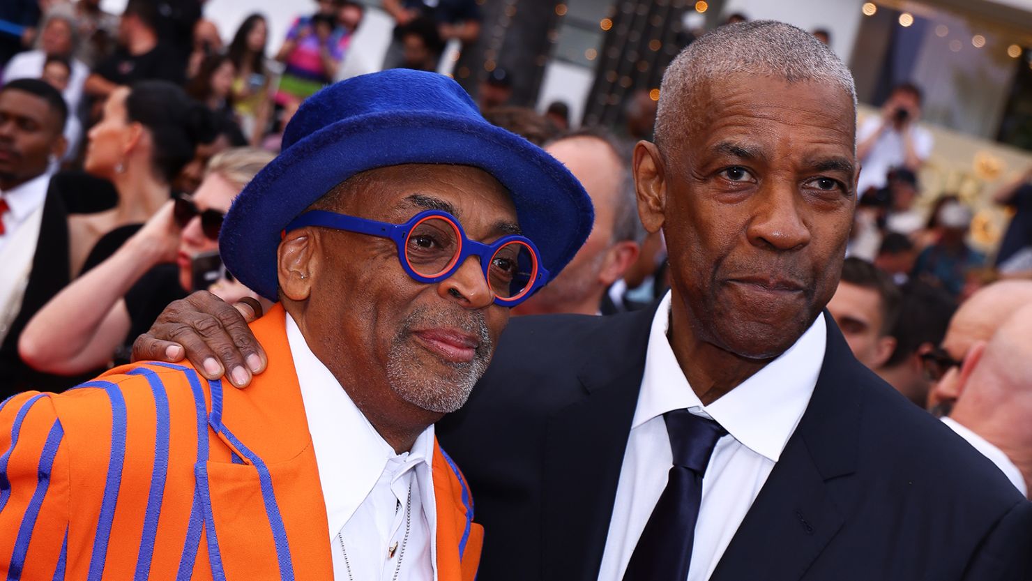 Spike Lee and Denzel Washington attend the "Highest 2 Lowest" red carpet at the 78th annual Cannes Film Festival at Palais des Festivals on May 19, 2025 in Cannes, France.