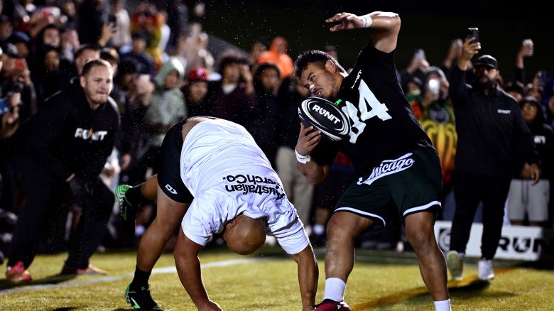 Players collide with each other without any protective gear in the final of the RUNIT Championship League at The Trusts Arena on May 19, 2025 in Auckland, New Zealand.