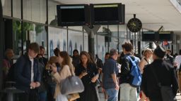 People waiting at a station after a significant power outage was reported by local authorities in Alpes-Maritimes in France on May 24, 2025.