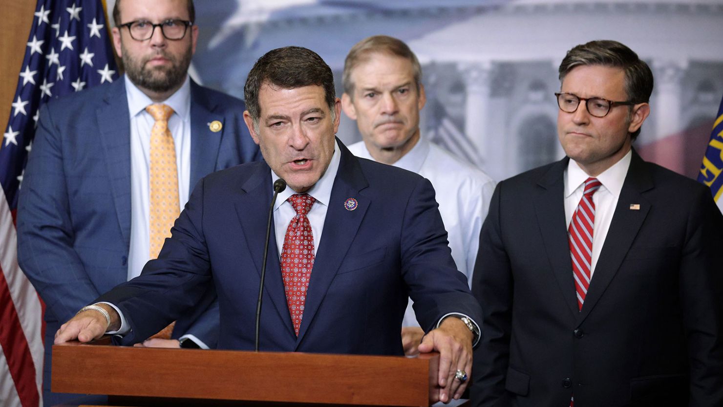 Rep. Mark Green speaks as Rep. Jason Smith, Rep. Jim Jordan, and Speaker of the House Mike Johnson listen during a news briefing after a House Republican Conference meeting with President Donald Trump at the US Capitol on May 20, 2025 in Washington, DC.
