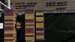 A container ship is pictured being unloaded at the Port of Oakland in May 2025 in Oakland, California.
