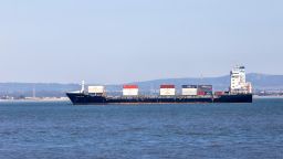 A cargo ship loaded with containers sails near the coast in Lisbon, Portugal, on May 24, 2025. Trump's proposed 50% tariff on EU goods alarms exporters in Germany, Ireland, and Italy. The announcement triggers a decline in China-U.S. shipping traffic. (Photo by Luis Boza/NurPhoto via Getty Images)