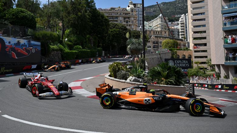 Lando Norris leads Charles Leclerc into the Fairmont Hairpin during the Monaco Grand Prix.
