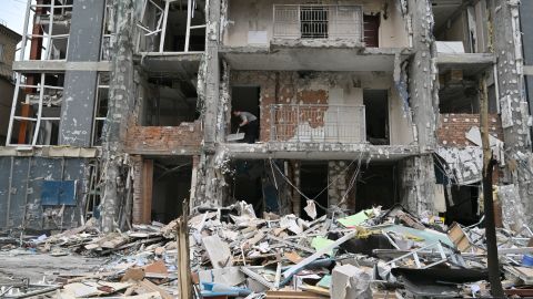 A local resident of a multistory residential building clears debris from his flat damaged following a drone strike in Kyiv on May 25, 2025, amid Russian invasion in Ukraine. Russia launched a record number of drones against Ukraine and killed 12 people across the country, officials said on May 25, even as Kyiv and Moscow completed their biggest prisoner exchange since the start of the war. (Photo by Sergei SUPINSKY / AFP) (Photo by SERGEI SUPINSKY/AFP via Getty Images)