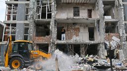 A local resident stands in a damaged flat of a multistory residential building following a drone strike in Kyiv on May 25, 2025, amid Russian invasion in Ukraine. Russia launched a record number of drones against Ukraine and killed 12 people across the country, officials said on May 25, even as Kyiv and Moscow completed their biggest prisoner exchange since the start of the war. (Photo by Sergei SUPINSKY / AFP) (Photo by SERGEI SUPINSKY/AFP via Getty Images)          