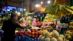 A person buys fruits inside a market in Kolkata, India, on May 25, 2025. (Photo by Sudipta Das/NurPhoto via Getty Images)