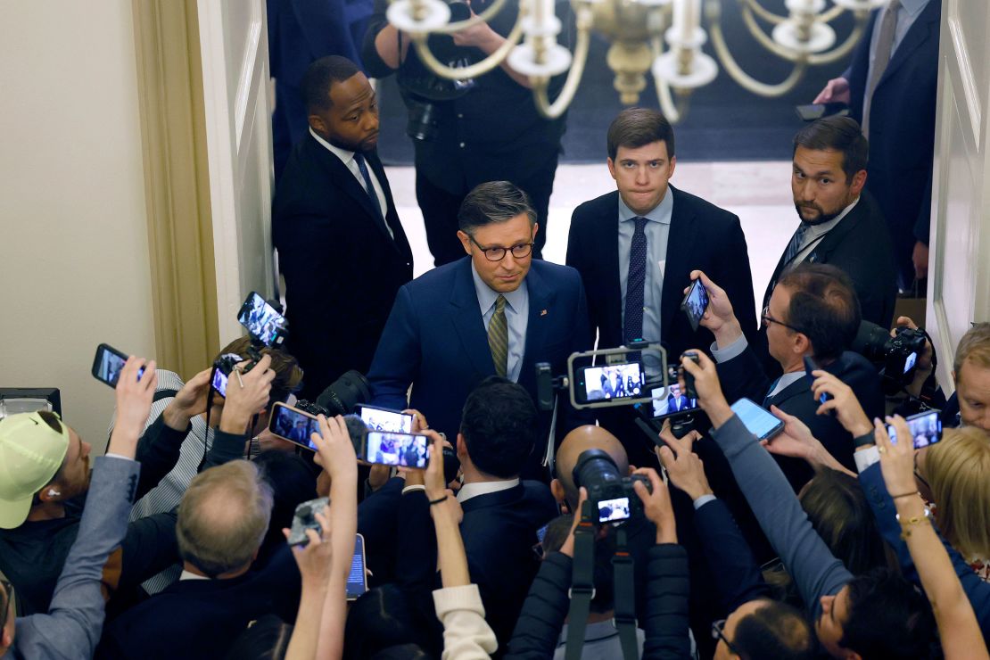 House Speaker Mike Johnson speaks to reporters as he departs for the White House as ongoing negotiations between House leadership, the White House and the House Freedom Caucus on the 