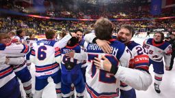US players celebrate after winning the IIHF Men's Ice Hockey World Championship final match between Switzerland and USA in Stockholm, on May 25, 2025.