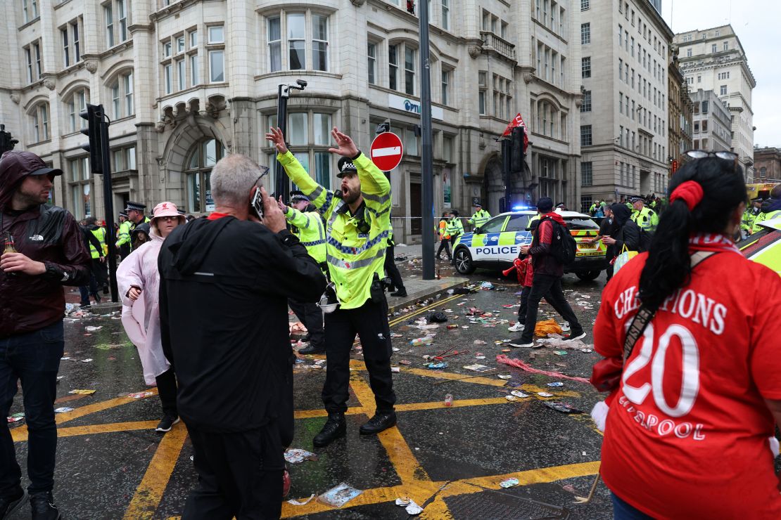Police keep fans away from the scene of the incident.