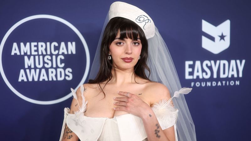 Rebecca Black dresses for a shotgun wedding at the AMAs in Vegas Rebecca Black dresses for a shotgun wedding at the AMAs in Vegas