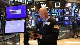 A trader works on the floor of the New York Stock Exchange. Analysts cautioned Thursday that the economic pain caused by tariffs remains.