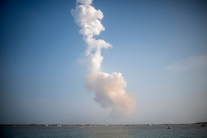A plume of exhaust trails from a Starship rocket after a test launch from South Texas on May 27.