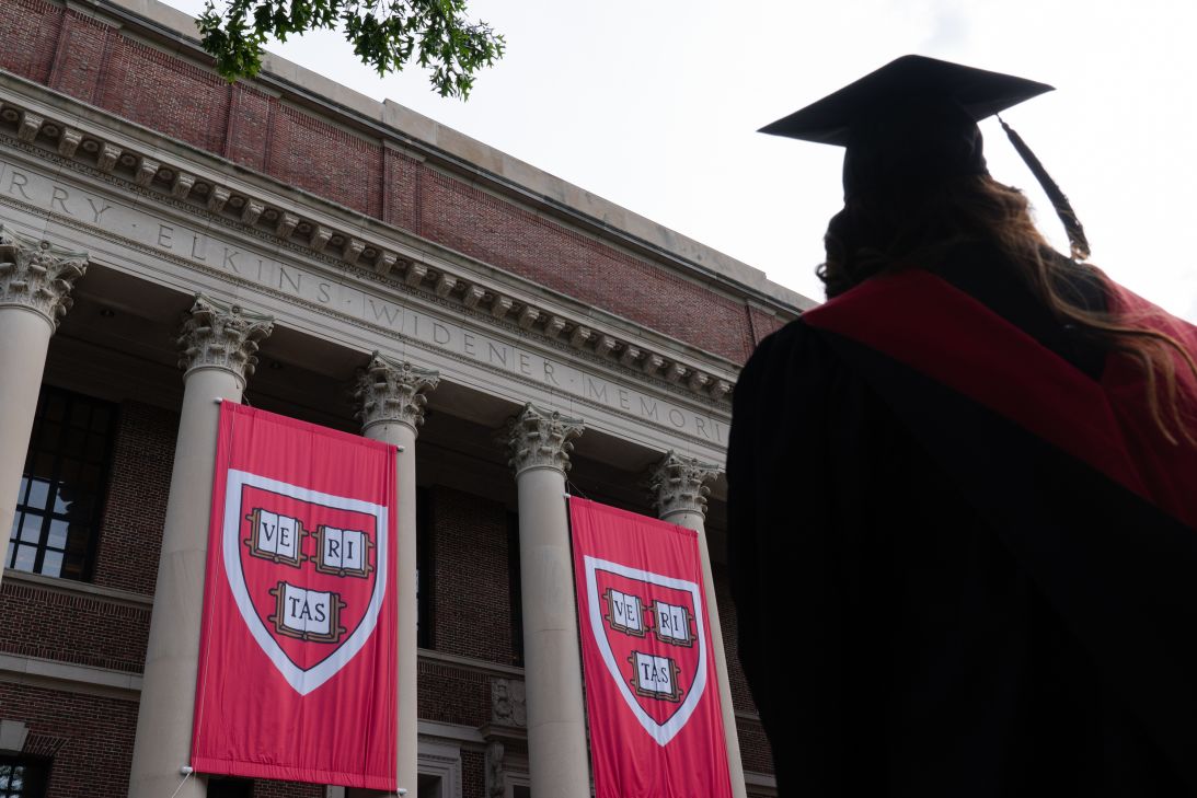 A student in front of the Harry Elkins Widener Memorial Library on the Harvard University campus in Cambridge, Massachusetts, on Tuesday, May 27, 2025.