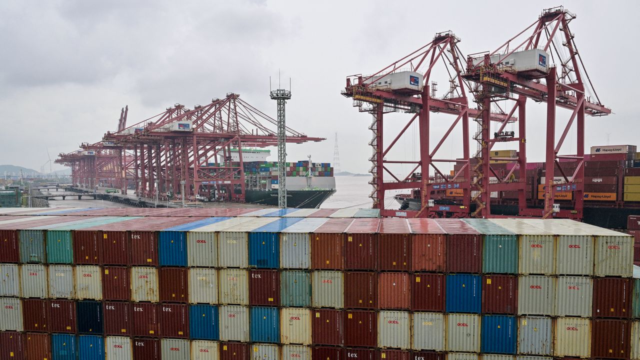 Containers and cargo ships are seen at the Port of Ningbo-Zhoushan in Ningbo, in China's eastern Zhejiang Province on May 28, 2025.