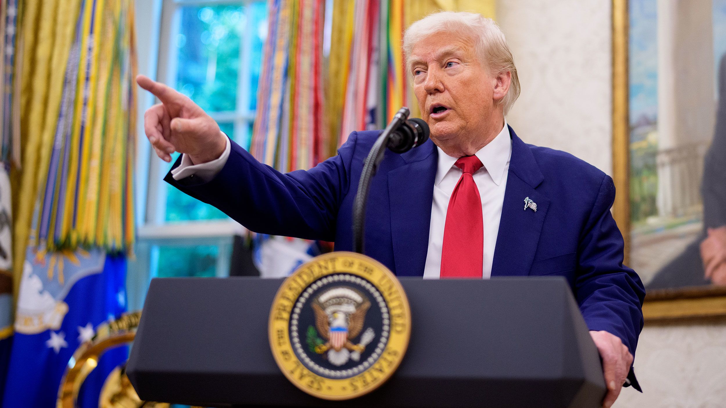 President Donald Trump takes a question during a swearing in ceremony for interim US Attorney for Washington, DC Jeanine Pirro in the Oval Office of the White House on May 28.